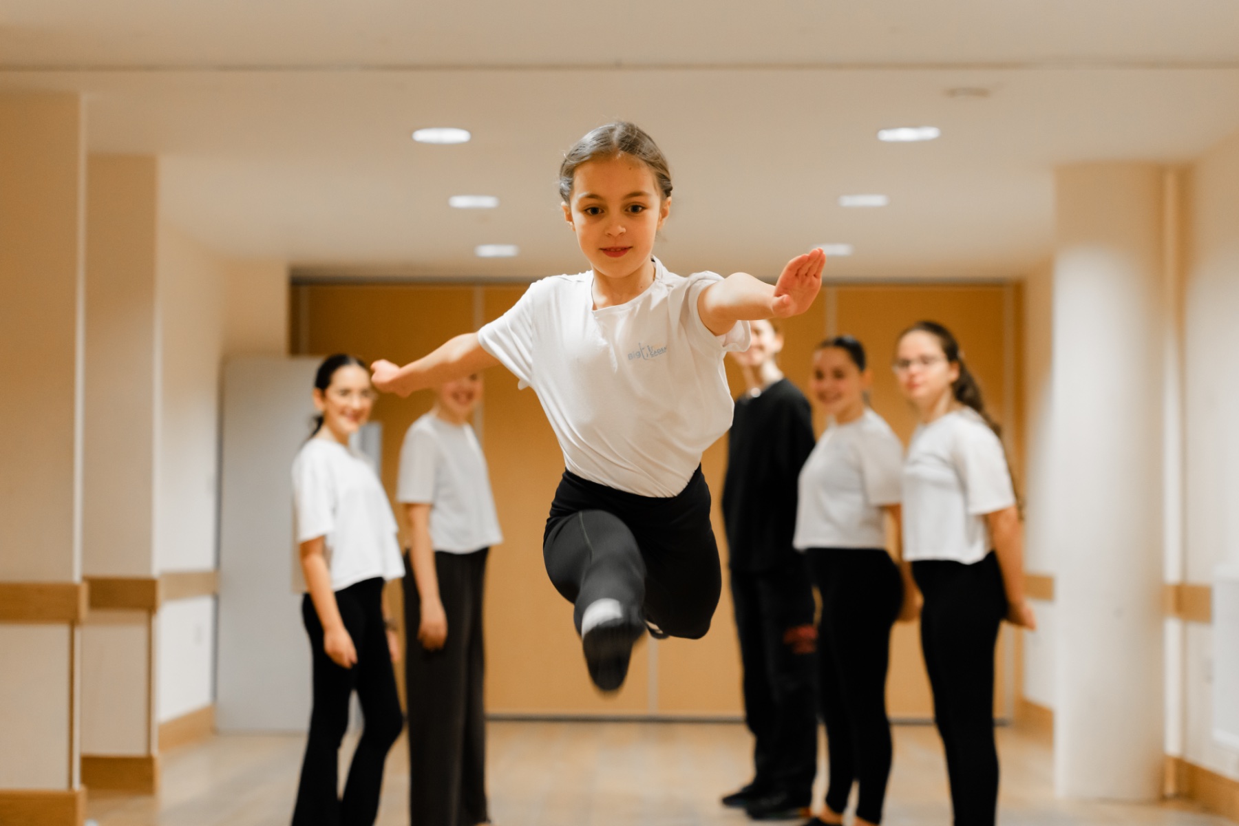 Young dancers performing on stage