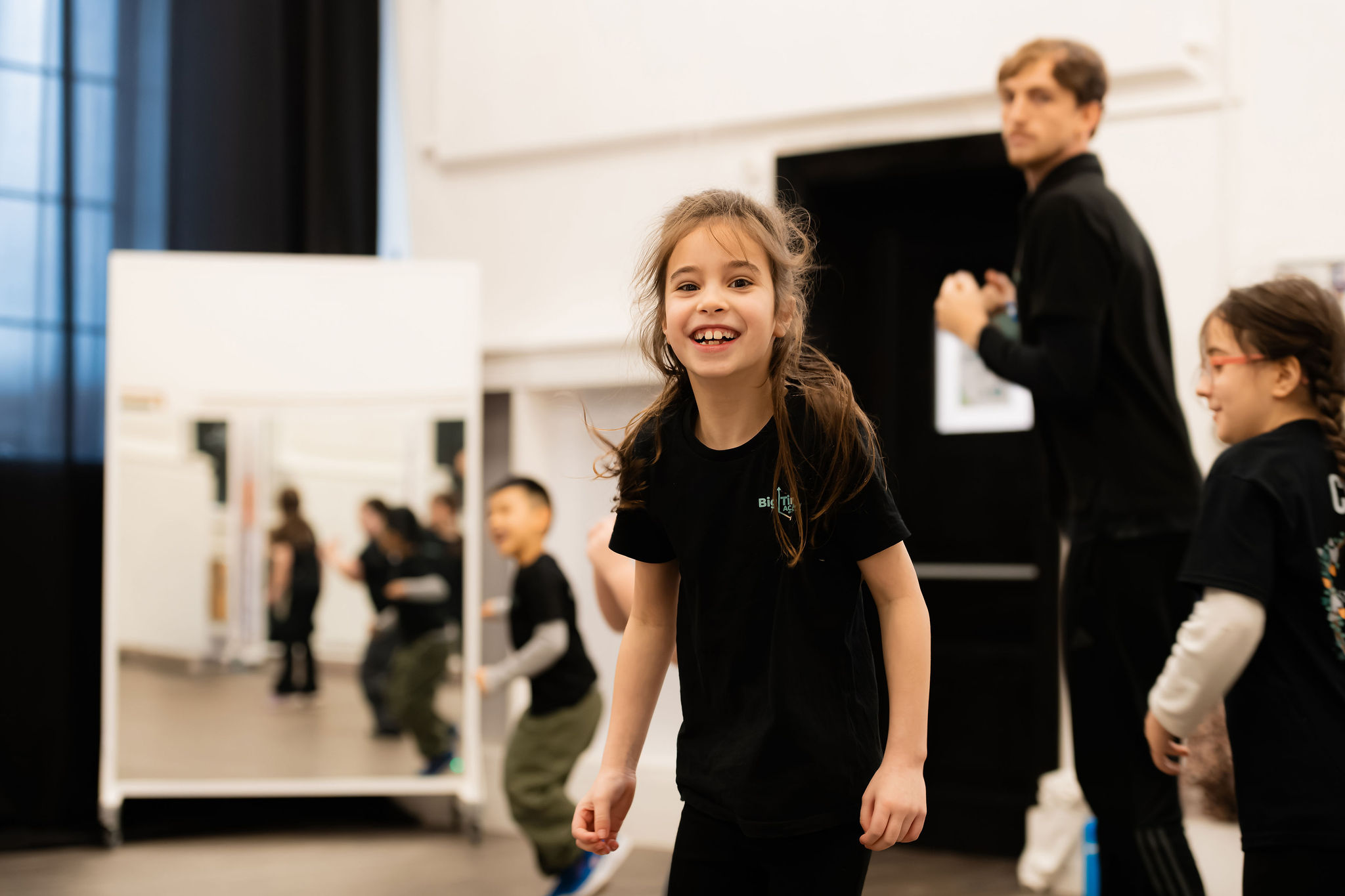 Smiling Big Time student in a rehearsal class