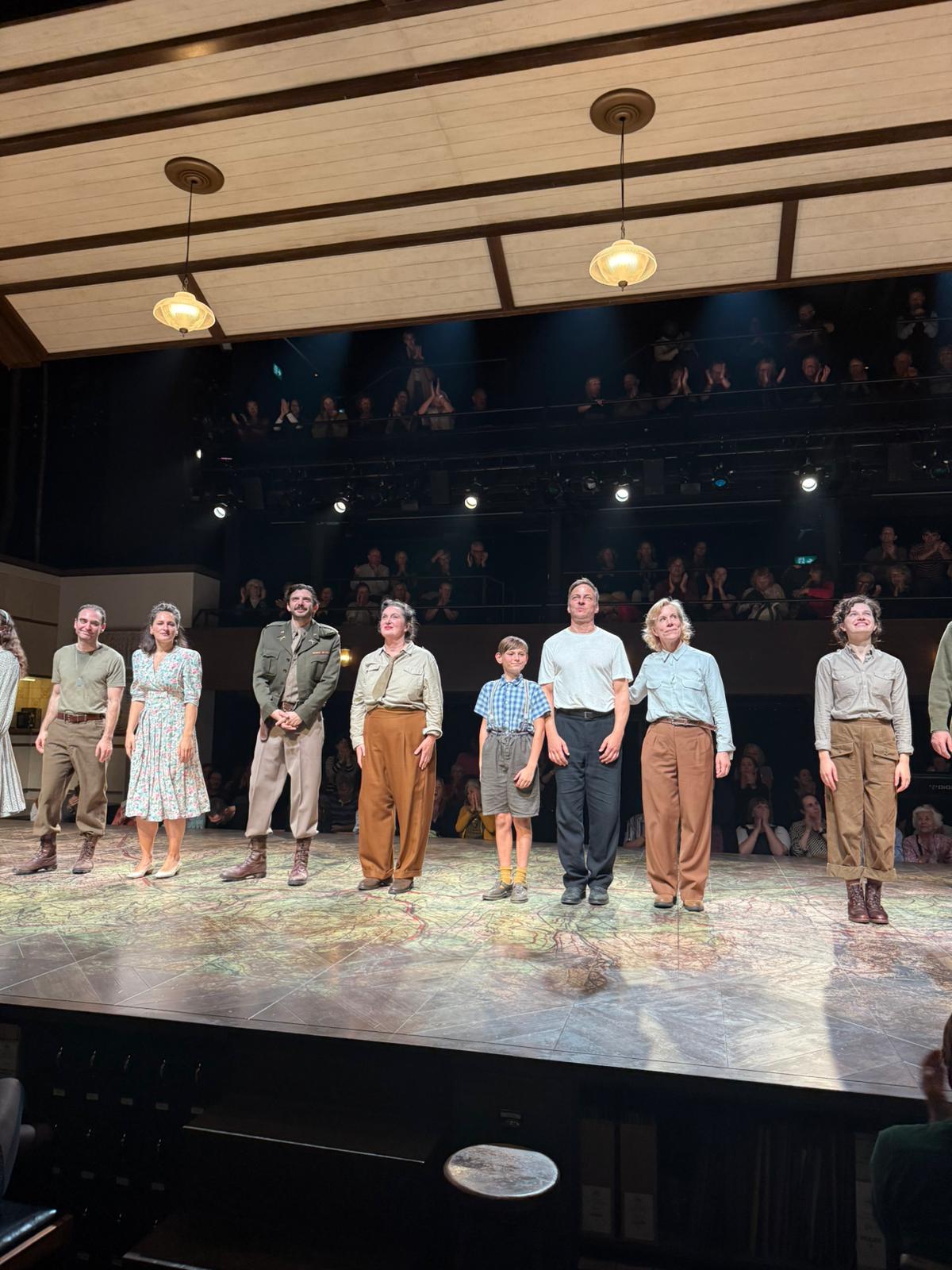 Big Time Management young performer in The Land of the Living curtain call at the National Theatre